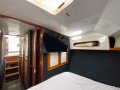 Randell 42 Flybridge " Repowered 30 knot Boat ":Master cabin TV