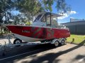 5.9m Fiberglass Fishing Vessel on Tandem Trailer