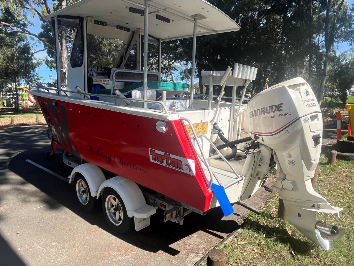 5.9m Fiberglass Fishing Vessel on Tandem Trailer