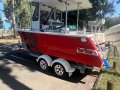 5.9m Fiberglass Fishing Vessel on Tandem Trailer