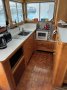 Kevin Dick 36Ft Catamaran:Galley straight off rear deck