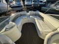 Four Winns Horizon 250 on trailer