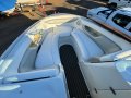 Four Winns Horizon 250 on trailer