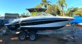 Four Winns Horizon 250 on trailer