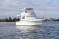 Caribbean 35 Flybridge Cruiser with Only 820 Hours