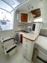 Farrier F-36:main companionway, step lift upo and are sely deploying on entry