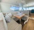 K2 Marine Wright 52 Powercat:Saloon with electric pedestal table
