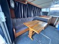 Laguna 42 Flybridge " Refitted and Launched December 2023:Port lounge and Table
