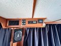 Laguna 42 Flybridge " Refitted and Launched December 2023:Port lounge head entertainment unit