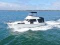Northshore 37 Flybridge Cruiser Impressive Condition, Rare side boarding door