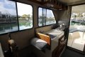 Cuddles 30 Flybridge Cruiser