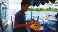 Trawler boat converted to a surf charter