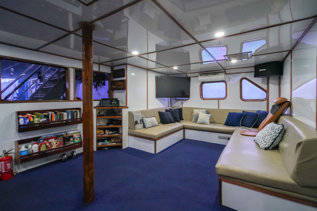 Trawler boat converted to a surf charter