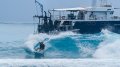 Trawler boat converted to a surf charter