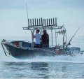 Trawler boat converted to a surf charter