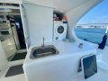 Oram 60 Daggerboard Performance Catamaran:Cockpit sink   dyer