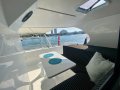 Oram 60 Daggerboard Performance Catamaran:Cockpit table/ lounge