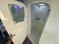 Oram 60 Daggerboard Performance Catamaran:Saloon shower