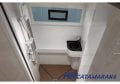 HH Catamarans HH55 Carbon Fiber Peformance Catamaran:Guest shower with water tight cabinet and a sink