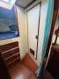Dutch built sailing yacht with classic lines:cloth hanging locker opposite