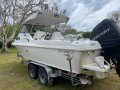 Caribbean Reef Runner 200hp Mercury Optimax (400 hrs approx)