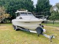 Caribbean Reef Runner 200hp Mercury Optimax (400 hrs approx)