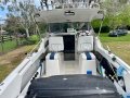 Caribbean Reef Runner 200hp Mercury Optimax ( 300 hrs approx)