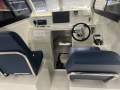 New Sea Rider 6.4 Walkaround boat motor trailer package