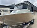 New Sea Rider 6.4 Walkaround boat motor trailer package
