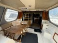 Markline 1100 Flybridge Cruiser - Diesel shaft drive, twin cabin.