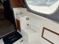 Markline 1100 Flybridge Cruiser - Diesel shaft drive, twin cabin.