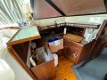 Markline 1100 Flybridge Cruiser - Diesel shaft drive, twin cabin.