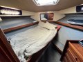 Markline 1100 Flybridge Cruiser - Diesel shaft drive, twin cabin.