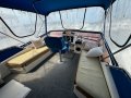 Markline 1100 Flybridge Cruiser - Diesel shaft drive, twin cabin.