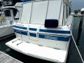 Markline 1100 Flybridge Cruiser - Diesel shaft drive, twin cabin.