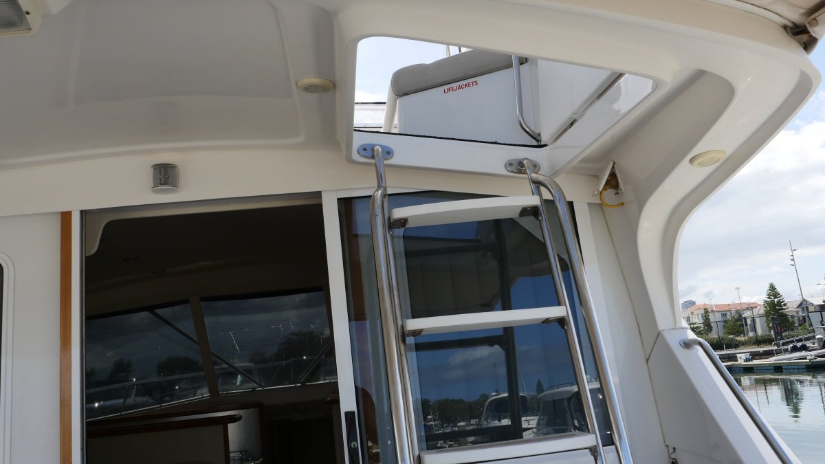  Caribbean 35 Flybridge Cruiser Boat Brokers of Tasmania