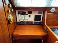 Sweden Yachts 390 - Luxury Performance Cruiser for Offshore Saiing:Navigation station with access to house battery bank