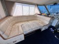 Precision 50 Flybridge Convertible " DUAL HELM ":Port lounge as double bed