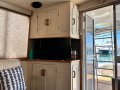 Precision 50 Flybridge Convertible " DUAL HELM ":TV