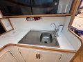 Precision 50 Flybridge Convertible " DUAL HELM ":Sink and Storage