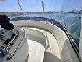 Precision 50 Flybridge Convertible " DUAL HELM ":Recovered flybridge seats