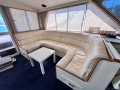 Precision 50 Flybridge Convertible " DUAL HELM ":Port Lounge