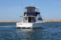 Caribbean 32 Flybridge Cruiser with Twin Cummins Diesels