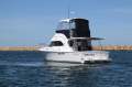 Caribbean 32 Flybridge Cruiser with Twin Cummins Diesels