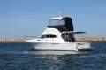 Caribbean 32 Flybridge Cruiser with Twin Cummins Diesels