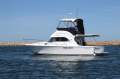 Caribbean 32 Flybridge Cruiser with Twin Cummins Diesels
