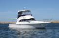 Caribbean 32 Flybridge Cruiser with Twin Cummins Diesels