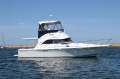 Caribbean 32 Flybridge Cruiser with Twin Cummins Diesels