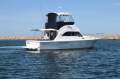 Caribbean 32 Flybridge Cruiser with Twin Cummins Diesels