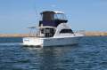 Caribbean 32 Flybridge Cruiser with Twin Cummins Diesels